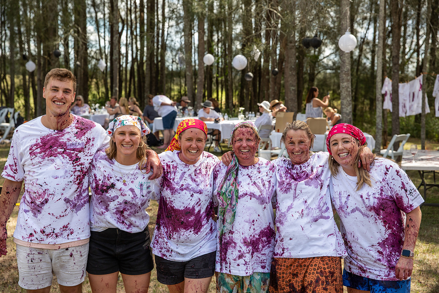 Stomp Wines Annual Stomp features people covered in grape juice